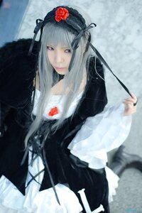 Rating: Safe Score: 0 Tags: 1girl bangs blurry blurry_background depth_of_field flower frills gothic_lolita lips lolita_fashion long_hair looking_at_viewer silver_hair solo suigintou User: admin