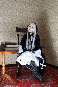 Rating: Safe Score: 0 Tags: 1girl black_footwear boots cross-laced_footwear dress frills lace-up_boots long_hair ribbon sitting solo suigintou white_hair User: admin
