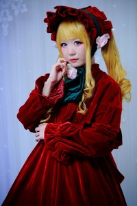 Rating: Safe Score: 0 Tags: 1girl bangs blonde_hair blue_background blue_eyes bonnet dress drill_hair flower lips long_hair long_sleeves looking_at_viewer realistic red_dress rose shinku solo User: admin