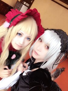 Rating: Safe Score: 0 Tags: 2girls bangs blonde_hair blue_eyes closed_mouth gothic_lolita hairband lips lolita_fashion long_hair looking_at_viewer multiple_cosplay multiple_girls photo red_eyes shinku smile suigintou tagme User: admin