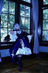Rating: Safe Score: 0 Tags: 1girl dress flower frills gothic_lolita indoors long_sleeves outstretched_hand solo suigintou window User: admin