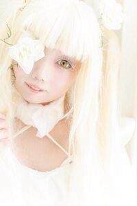 Rating: Safe Score: 0 Tags: 1girl bangs blonde_hair close-up flower kirakishou lips long_hair looking_at_viewer parted_lips rose smile solo white_flower white_rose yellow_eyes User: admin