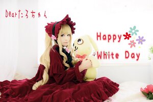 Rating: Safe Score: 0 Tags: 1girl blonde_hair blue_eyes bonnet bow copyright_name dated dress english_text flower happy_birthday happy_new_year long_hair long_sleeves new_year red_dress shinku sitting solo User: admin