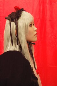 Rating: Safe Score: 0 Tags: 1girl eyelashes flower from_side hair_flower hair_ornament hair_ribbon lips long_hair profile realistic red_background red_eyes red_theme ribbon solo suigintou upper_body white_hair User: admin