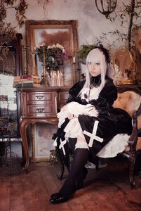 Rating: Safe Score: 0 Tags: 1girl bangs dress flower indoors long_hair sitting solo suigintou white_hair User: admin