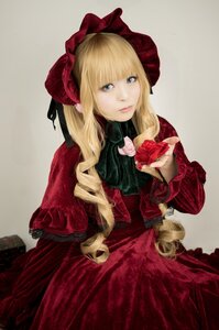 Rating: Safe Score: 0 Tags: 1girl blonde_hair blue_eyes bonnet bow capelet dress drill_hair flower holding_flower lips long_hair long_sleeves looking_at_viewer pink_rose red_capelet red_dress red_flower red_rose rose shinku simple_background solo User: admin