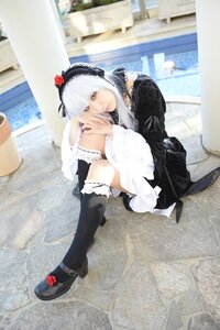 Rating: Safe Score: 0 Tags: 1girl black_footwear black_legwear blurry dress frills gothic_lolita hairband lolita_fashion long_sleeves looking_at_viewer photo red_eyes shoes sitting solo suigintou User: admin