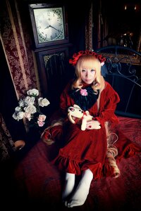 Rating: Safe Score: 0 Tags: 1girl blonde_hair blue_eyes dress drill_hair flower long_hair red_dress rose shinku sitting solo stuffed_animal very_long_hair User: admin