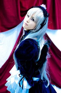 Rating: Safe Score: 0 Tags: 1girl blue_eyes butterfly_wings curtains dress frills hairband lips long_hair long_sleeves looking_at_viewer ribbon silver_hair solo suigintou wings User: admin