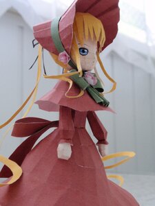 Rating: Safe Score: 0 Tags: 1girl blonde_hair blue_eyes bonnet doll dress hat long_hair long_sleeves looking_at_viewer looking_back red_dress shinku solo standing twintails very_long_hair User: admin