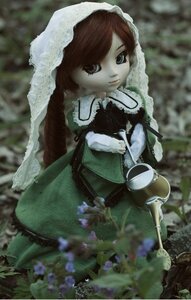 Rating: Safe Score: 0 Tags: 1girl black_dress blurry blurry_background blurry_foreground brown_hair cup depth_of_field doll dress green_dress holding long_hair long_sleeves looking_at_viewer outdoors solo standing suiseiseki veil User: admin