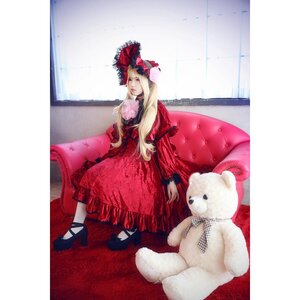 Rating: Safe Score: 0 Tags: 1girl blonde_hair blue_eyes bow couch dress high_heels lolita_fashion long_hair red_dress shinku shoes sitting solo stuffed_animal traditional_media User: admin