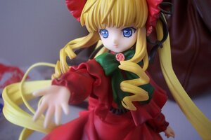 Rating: Safe Score: 0 Tags: 1girl auto_tagged bangs blonde_hair blue_eyes blurry bow bowtie doll dress drill_hair flower green_bow long_hair long_sleeves looking_at_viewer photo pink_rose red_dress rose shinku sidelocks solo twintails very_long_hair User: admin