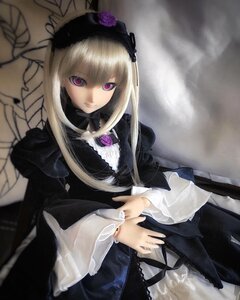 Rating: Safe Score: 0 Tags: 1girl black_dress doll dress flower frills lolita_fashion long_hair long_sleeves looking_at_viewer rose sitting solo suigintou User: admin