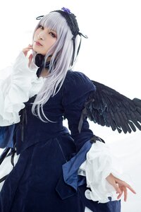 Rating: Safe Score: 0 Tags: 1girl bangs black_wings dress feathered_wings feathers frilled_sleeves frills gothic_lolita lips long_hair long_sleeves looking_at_viewer silver_hair solo suigintou wings User: admin