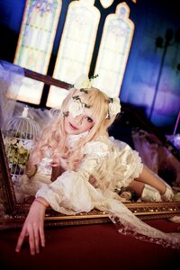 Rating: Safe Score: 0 Tags: 1girl bangs blonde_hair dress flower frills hair_ornament kirakishou lace lips long_hair looking_at_viewer lying solo white_dress User: admin