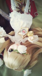 Rating: Safe Score: 0 Tags: 1girl blonde_hair doll dress flower green_eyes kirakishou lace lips lolita_fashion long_hair solo User: admin