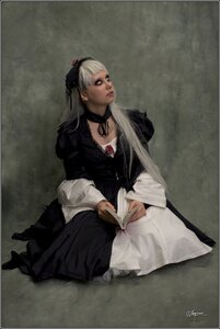 Rating: Safe Score: 0 Tags: 1girl choker dress gothic_lolita lips long_hair long_sleeves nose realistic signature silver_hair sitting solo suigintou User: admin