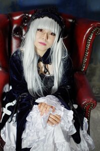 Rating: Safe Score: 0 Tags: 1girl bangs black_dress blurry chair closed_mouth dress frilled_sleeves frills gothic_lolita hairband lips lolita_fashion long_hair long_sleeves looking_at_viewer red_eyes sitting solo suigintou User: admin