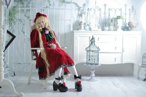 Rating: Safe Score: 0 Tags: 1girl blonde_hair bow closed_eyes dress flower long_hair red_dress shinku shoes sitting solo twintails User: admin