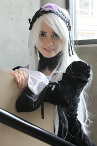 Rating: Safe Score: 0 Tags: 1girl dress holding indoors long_hair long_sleeves looking_at_viewer photo ribbon smile solo suigintou white_hair User: admin