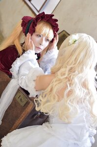 Rating: Safe Score: 0 Tags: 1girl bangs blonde_hair bow chin_rest dress frills head_rest lips long_hair multiple_cosplay sitting solo tagme User: admin