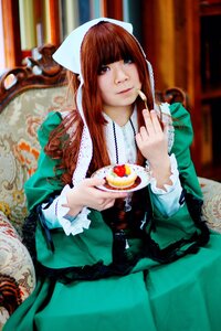 Rating: Safe Score: 0 Tags: 1girl bangs bow brown_hair chair dress food green_dress lips long_hair long_sleeves looking_at_viewer red_eyes sitting solo spoon suiseiseki User: admin