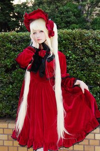 Rating: Safe Score: 0 Tags: 1girl blonde_hair blue_eyes bonnet bow dress flower lips lolita_fashion long_hair long_sleeves looking_at_viewer red_dress rose shinku solo standing User: admin