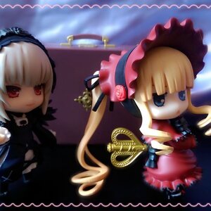 Rating: Safe Score: 0 Tags: 2girls bangs blonde_hair blue_eyes bonnet chibi doll dress frills hat long_hair looking_at_viewer multiple_girls red_eyes shinku solo suigintou User: admin