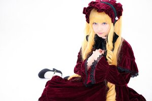 Rating: Safe Score: 0 Tags: 1girl blonde_hair blue_eyes bonnet breasts dress lips lolita_fashion long_hair looking_at_viewer red_dress shinku sitting solo User: admin