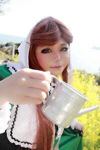 Rating: Safe Score: 0 Tags: 1girl blurry brown_hair cup depth_of_field flower green_eyes hair_ornament heterochromia holding holding_cup lips looking_at_viewer mug red_eyes smile solo striped suiseiseki vertical_stripes User: admin