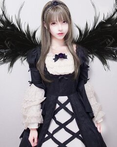 Rating: Safe Score: 0 Tags: 1girl blonde_hair dress flower lips long_hair realistic solo suigintou wings User: admin