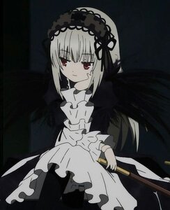 Rating: Safe Score: 0 Tags: 1girl bangs black_background closed_mouth dress eyebrows_visible_through_hair frills hairband image long_sleeves looking_at_viewer monochrome red_eyes solo suigintou wings User: admin