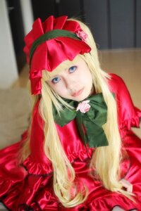 Rating: Safe Score: 0 Tags: 1girl blonde_hair blue_eyes blurry blurry_background bow bowtie depth_of_field dress flower lips long_hair long_sleeves looking_at_viewer photo pink_flower pink_rose red_dress rose shinku sitting solo User: admin