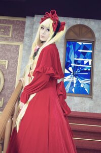 Rating: Safe Score: 0 Tags: 1girl blonde_hair blue_eyes bonnet bow dress flower long_hair long_sleeves looking_at_viewer painting_(object) red_dress shinku solo standing User: admin