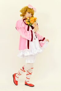 Rating: Safe Score: 0 Tags: 1girl blonde_hair blue_eyes bouquet curly_hair dress drill_hair flower full_body hinaichigo long_sleeves pink_bow pink_dress shoes solo striped vertical_stripes wide_sleeves User: admin
