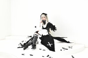 Rating: Safe Score: 0 Tags: 1girl boots dress feathers hairband long_hair sitting solo suigintou User: admin