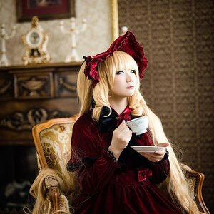Rating: Safe Score: 0 Tags: 1girl blonde_hair blue_eyes bow chair cup dress lips lolita_fashion long_hair realistic red_dress saucer shinku sitting solo table tea teacup twintails User: admin