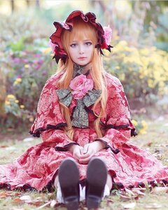 Rating: Safe Score: 0 Tags: 1girl bangs blonde_hair blue_eyes blurry blurry_background blurry_foreground bonnet depth_of_field dress flower frills lips long_hair looking_at_viewer pantyhose photo red_dress shinku sitting solo User: admin