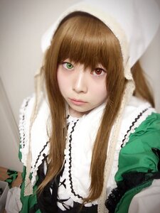 Rating: Safe Score: 0 Tags: 1girl bangs blurry brown_hair closed_mouth dress eyelashes green_eyes heterochromia lace lips long_hair looking_at_viewer makeup photo solo suiseiseki upper_body User: admin