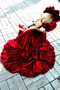 Rating: Safe Score: 0 Tags: 1girl blonde_hair blue_eyes bow capelet dress long_hair looking_at_viewer profile red_dress shinku sitting solo tile_floor tiles User: admin