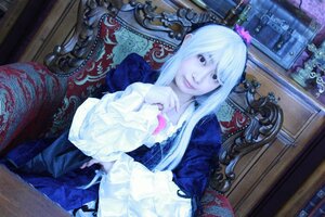 Rating: Safe Score: 0 Tags: 1girl dress indoors long_hair looking_at_viewer sitting smile solo suigintou white_hair User: admin