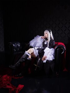 Rating: Safe Score: 0 Tags: 1girl black_footwear boots flower frills gothic_lolita lolita_fashion long_hair long_sleeves red_eyes sitting solo suigintou sword weapon white_hair User: admin
