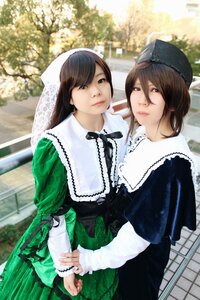 Rating: Safe Score: 0 Tags: 2girls 3d bangs black_dress blurry brown_eyes brown_hair building closed_mouth day depth_of_field dress fence green_dress hat head_scarf lace lips long_hair long_sleeves looking_at_viewer multiple_cosplay multiple_girls outdoors suiseiseki swept_bangs tagme User: admin