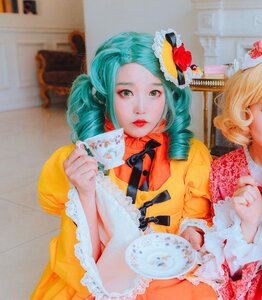 Rating: Safe Score: 0 Tags: 1girl aqua_hair flower frills green_eyes hair_flower hair_ornament indoors lips multiple_cosplay photo ribbon solo tagme teacup traditional_media User: admin