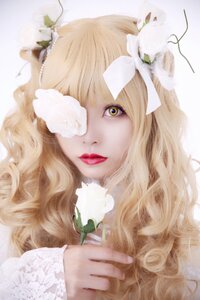 Rating: Safe Score: 0 Tags: 1girl bangs blonde_hair blue_eyes eyelashes flower hair_flower hair_ornament kirakishou lips long_hair one_eye_covered red_lips rose solo white_flower white_rose User: admin