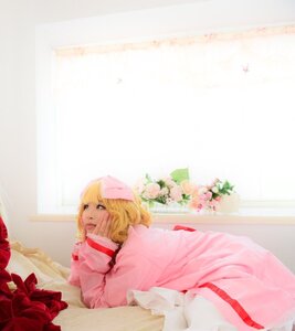 Rating: Safe Score: 0 Tags: 1girl blonde_hair blue_eyes flower hinaichigo lying pink_dress solo User: admin