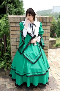 Rating: Safe Score: 0 Tags: 1girl brown_hair closed_eyes dress frills green_dress long_sleeves outdoors solo suiseiseki User: admin