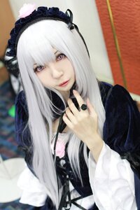 Rating: Safe Score: 0 Tags: 1girl bangs blurry blurry_background blurry_foreground closed_mouth depth_of_field hairband holding lips lolita_fashion long_hair long_sleeves looking_at_viewer photo purple_eyes solo suigintou upper_body User: admin