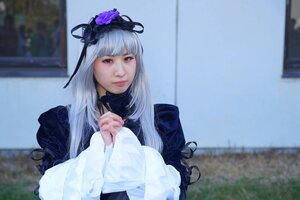 Rating: Safe Score: 0 Tags: 1girl bangs blurry blurry_background closed_mouth depth_of_field dress flower hair_flower hairband lips long_hair long_sleeves looking_at_viewer photo red_eyes solo suigintou upper_body User: admin